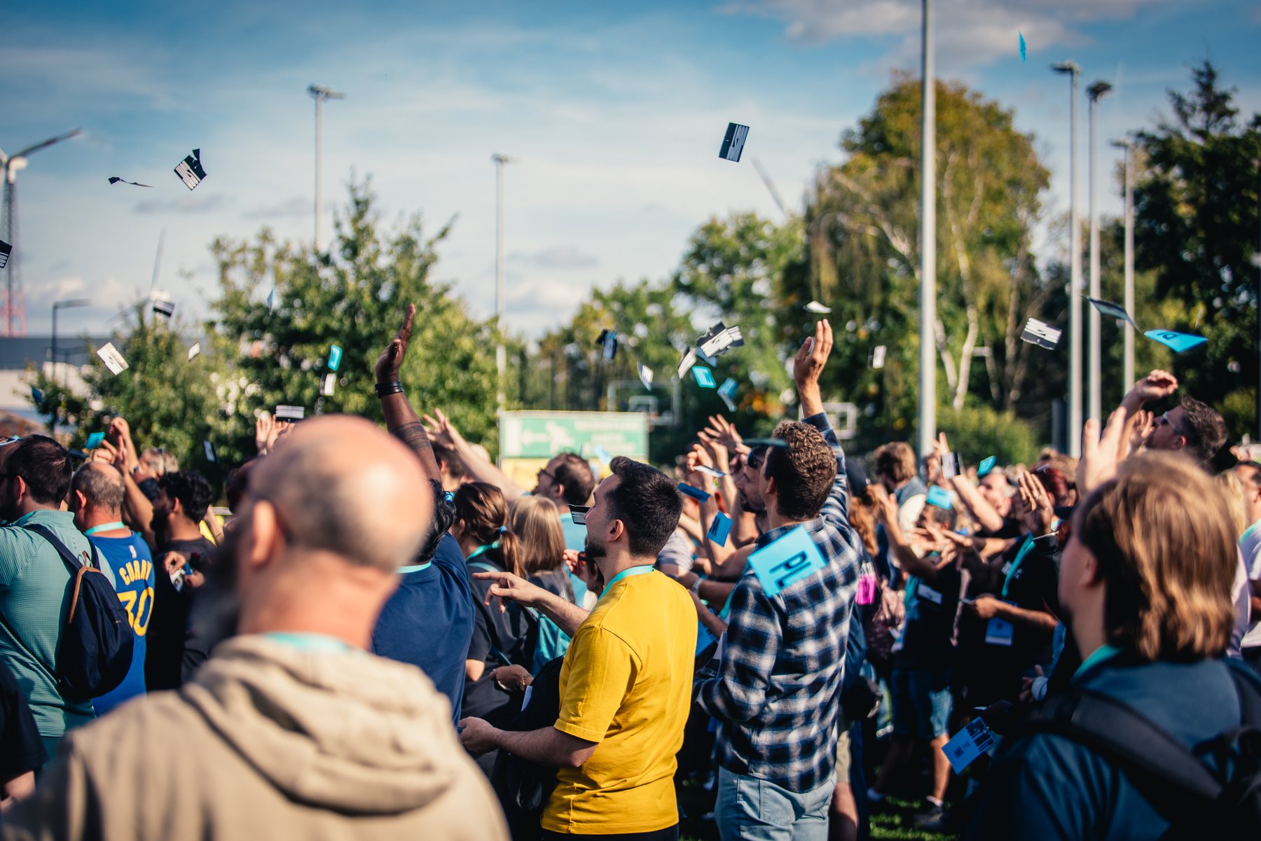 NIKE brand activation audience reacting as Jonas De Bruyn throws playing cards into the crowd