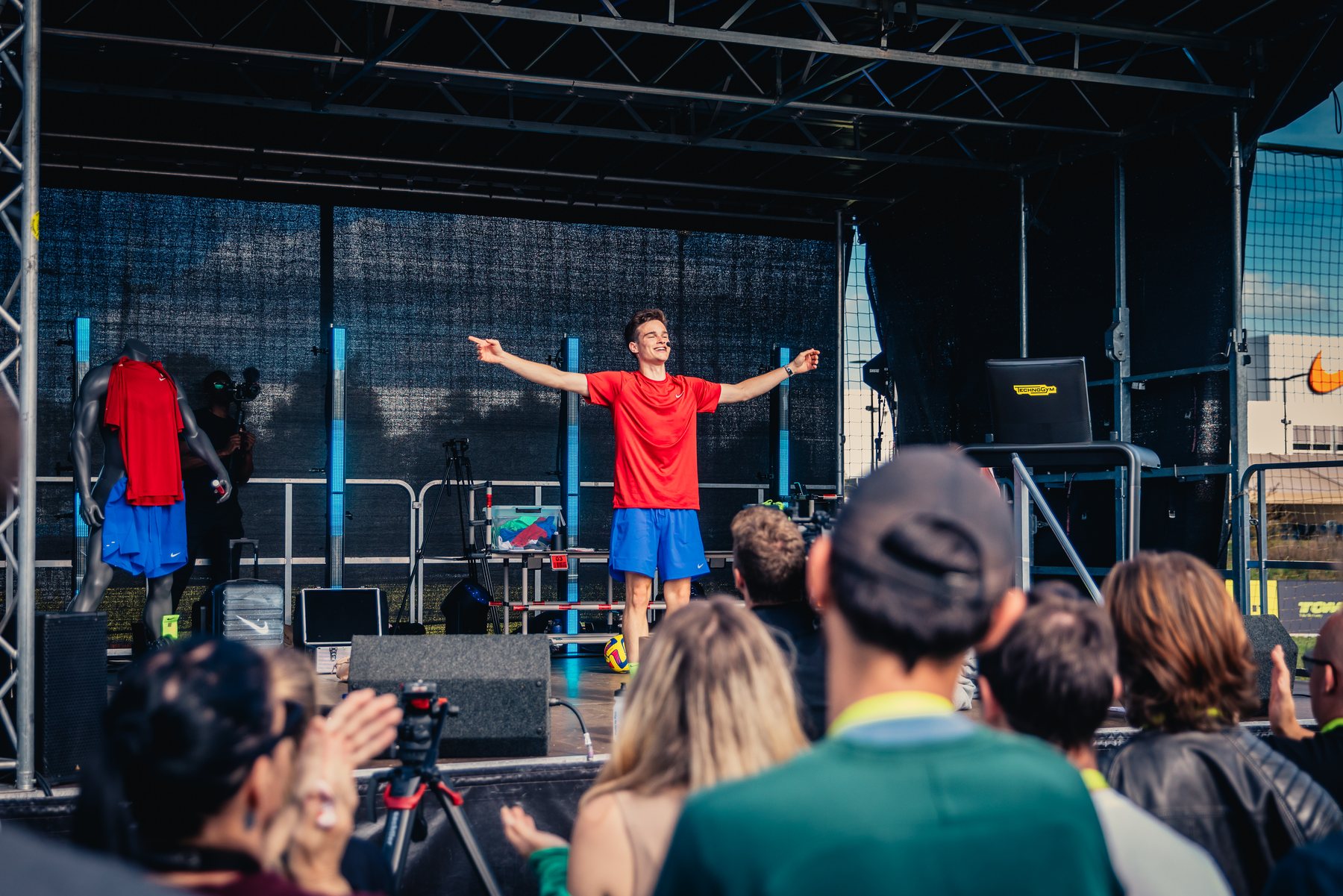 Jonas De Bruyn engaging a live audience during an outdoor NIKE brand activation